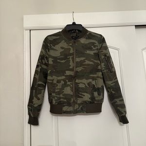 Green camouflage bomber jacket